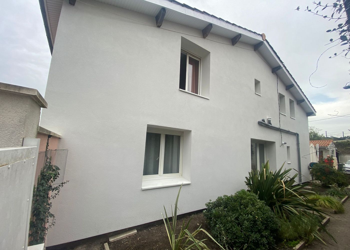 Façades d'une maison à Cenon apres ITE