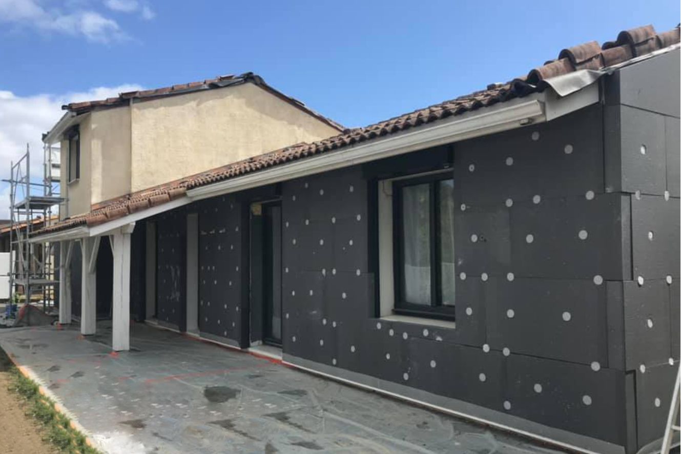 Pendant une chantier isolation thermique par l'extérieur ISO&FACE31